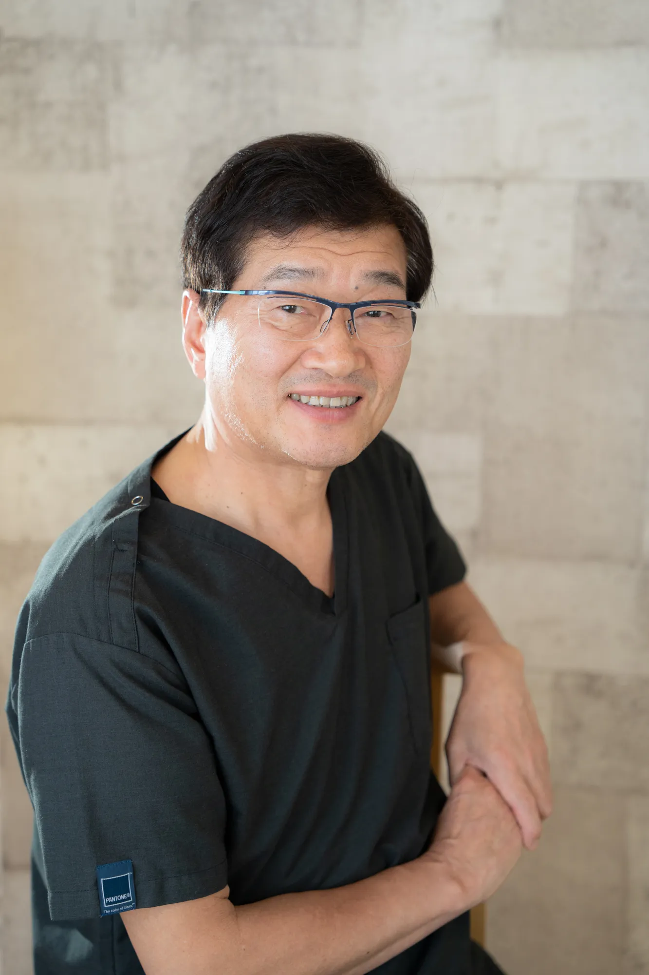 代表 今富 収治